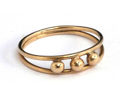 9ct gold dress ring decorated with 3 gold beads, size K.5, gross weight 1.29g