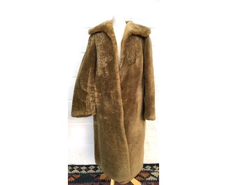 Vintage mouton coat, light gold colour, russet silk lining slightly damaged at collar but fur good (size 12 approx)