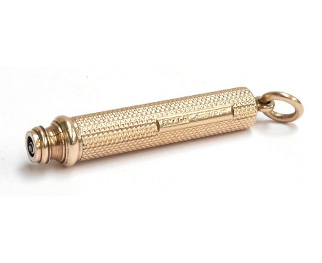 An 9ct gold propelling pencil by S. Morden &amp; Co., the outer case with suspension ring, stamped 'SM &amp; Co' , the inner 