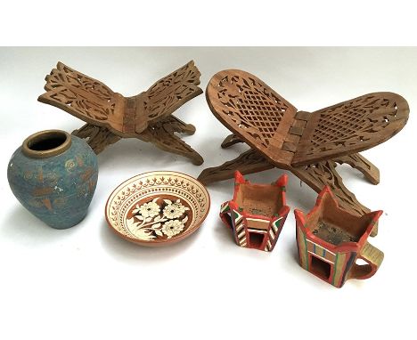 A pair of incense burners from Oman, two folding Quran readers, and a ceramic bowl and vase