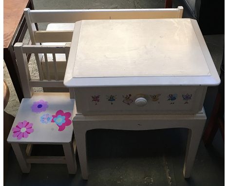 A white painted child's desk and chair, together with a child's bench/chest