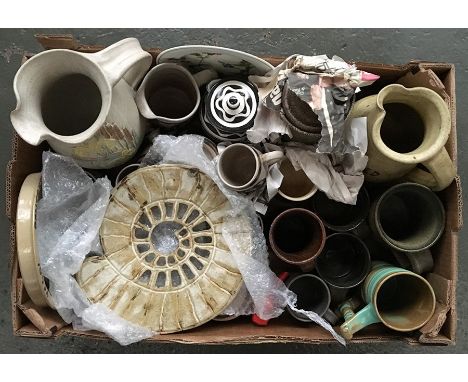 A box of studio pottery inc. Leach St. Ives coffee pot, etc., and an ammonite wall plaque