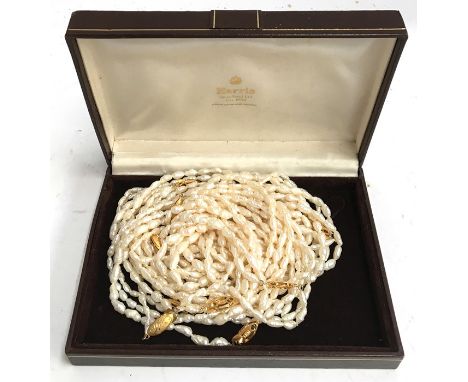 20 freshwater baroque cultured rice pearl strings with clasps, each approximately 17” long