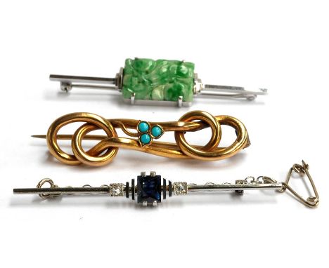 Three brooches, one 9ct gold brooch set with 3 turquoise stones , gross weight 3.5g, another 9ct white gold with a jade stone