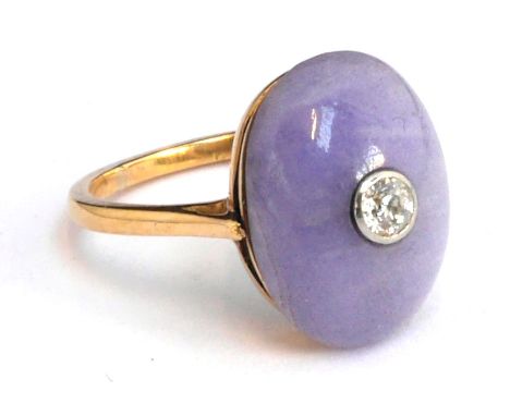 Gold dress  ring (tests as 21ct) set with a chalcedony stone with a brilliant cut diamond in the centre, size J, gross weight