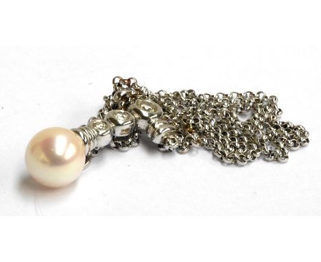 14ct white gold diamond and pearl pendant on chain which is approx 42cm long, gross weight 6.5g