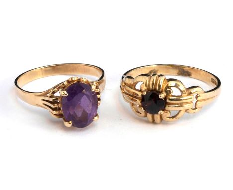 14ct ring set with amethyst on ornate scrolled shoulder, gross weight 2.5g, siz M together with 9ct gold dress ring , ornate 