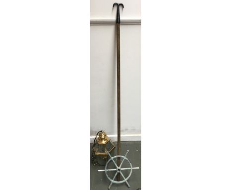 A vintage window opening hook pole, a ship's wheel, and a gilt metal and glass ceiling light