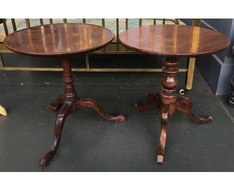 A mahogany tip-top occasional table on turned support and tripod base, 48x50cmH, together with a similar circular table with 