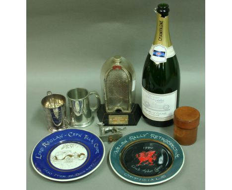 A NOVELTY PLATED SPIRIT FLASK in the form of a Bugatti radiator, together with a parcel of Bugatti related ephemera and a car