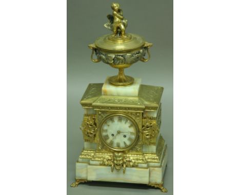 A FRENCH MANTLE CLOCK, late 19th century, the 4" marble dial with gilt roman numerals, brass eight day movement striking to a