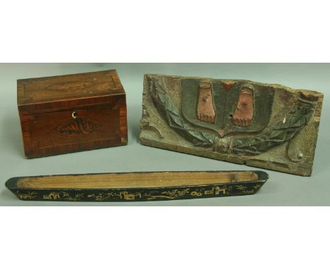 A GEORGE III MAHOGANY AND INLAID TEA CADDY with shell motif cover. Together with a carved oak heraldic part-frieze and a blac