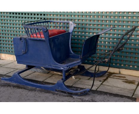 A BLUE PAINTED HORSE DRAWN SLEIGH, 19th century, two person button seat with turned spindle back rest, wrought iron mounts, l