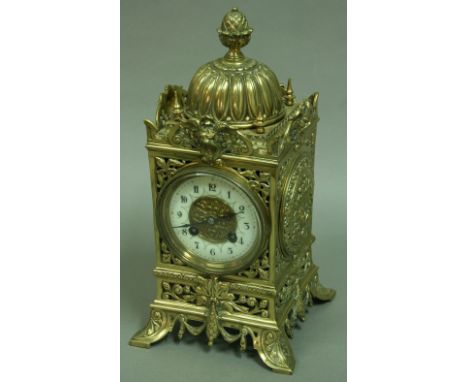 A FRENCH BRASS MANTEL CLOCK 3 3/4" ivorine dial with arabic numerals on a brass Japy Freres eight day movement, 31cm