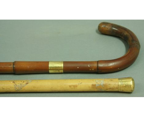A BRIG OF LONDON 18CT GOLD MOUNTED BAMBOO WALKING STICK with Raglan crest, Sheffield 1899. Together with another malaccar and