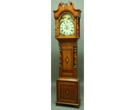 AN OAK AND INLAID LONGCASE CLOCK the arched painted dial with a view titled A Berkshire Ferry. The subsidiary date aperture a