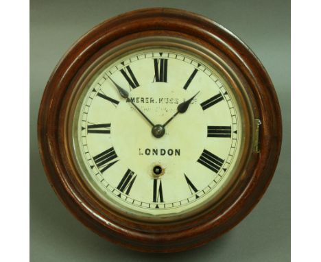 A MAHOGANY CASED WALL CLOCK, late 19th century, the 7" painted dial inscribed Amerer. Kuss Co. London, on a single train bras