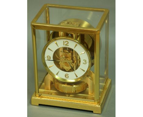 A JAEGER-LE-COULTRE ATMOS CLOCK, serial number 422322, in a brass four pane case, 22.5cm (lacking outer case)