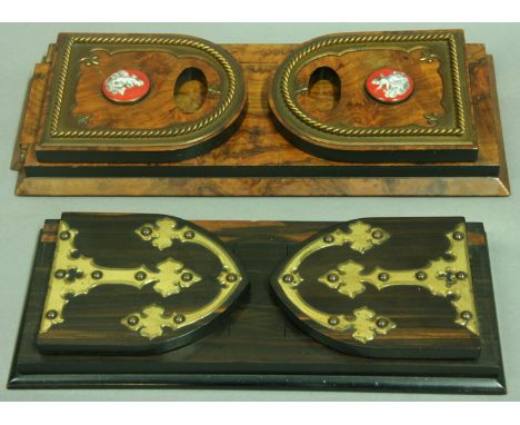 A VICTORIAN COROMANDEL AND BRASS MOUNTED BOOKSLIDE together with another walnut bookslide with brass and ceramic mounts (2).