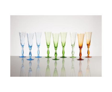 A set of 9 flutes from the RITZ ParisFranceCrystal with colours from the Ritz by the Cristallerie de PortieuxFoliage scrolls,