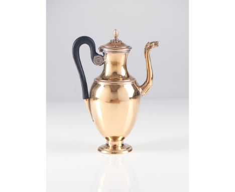 A jugFrench gilt silverMaker Jacques-Grégoire ROUSSEAU, oval shaped resting on stand with floral handle. Finely chiselled hor