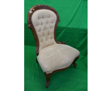 Antique button back nursing chair