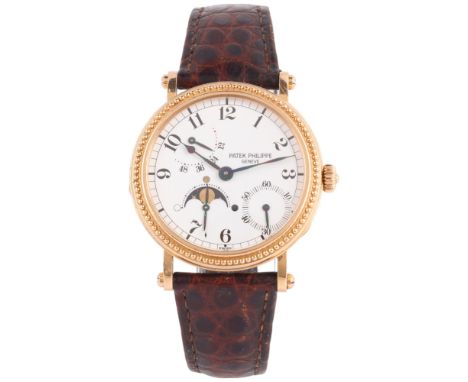 PATEK PHILIPPE - A Fine 'Age of the Moon' Automatic Wristwatch, ref. 5015, circa 1990s, white enamel dial with black Arabic n