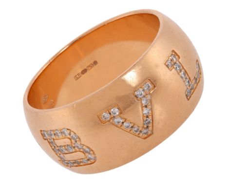 BULGARI - A Diamond Monologo Band Ring, the wide band with lettering "Bvlgari", set with modern round brilliant-cut diamonds,