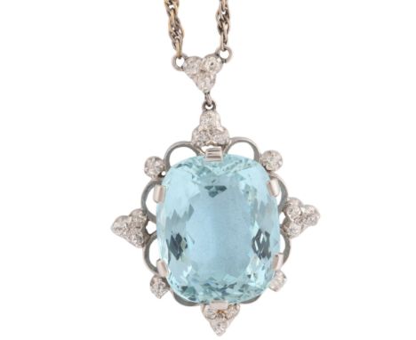 An Aquamarine and Diamond Pendant Necklace, set with an oval mixed cut aquamarine of approximately 13.00 carats, within an op