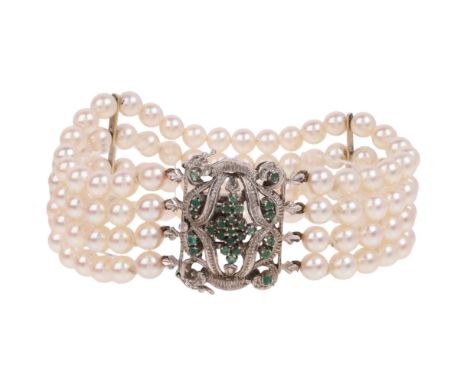 A Pearl and Emerald Bracelet, the quadruple strand bracelet set with 5.8mm pearls, separated by bar spacer links, terminating
