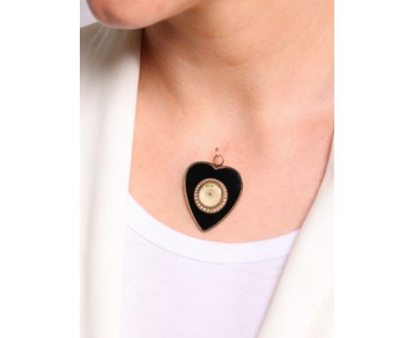 A Georgian Onyx and Pearl 'Lover's Eye' Miniature Heart Pendant, circa 1820, the polished black onyx heart having central dou