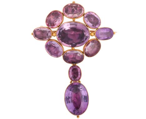 An Antique Georgian Amethyst Brooch, circa 1820, of Girandole design, rub-over set with foil-back oval mixed-cut amethysts, w