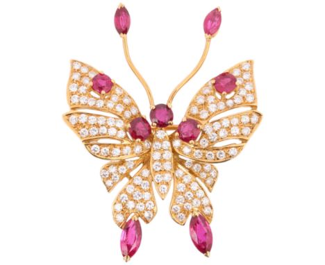 A Ruby and Diamond Butterfly Brooch, the head wing tips and antennae set with round and marquise-cut rubies, further set to b