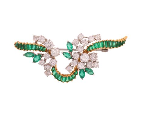 An Emerald and Diamond Brooch, of ribbon form, claw-set with a row of rectangular step cut emeralds, surmounted by modern rou