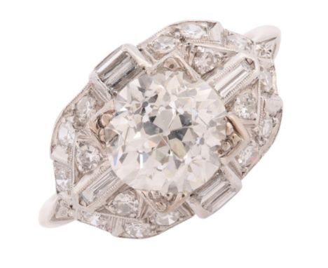 An Art Deco Diamond Ring, circa 1930, the bombe panel centrally square set with a GIA Certified 2.10 carat transitional round