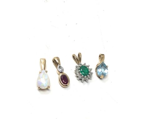 4 x 9ct gold gemstone pendants inc. topaz, emerald, opal, ruby &amp; diamond (2.8g)