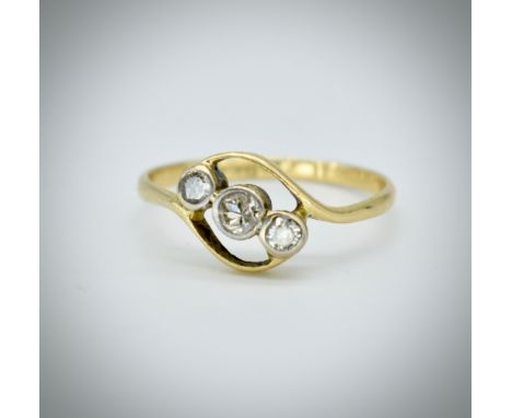 An 18ct gold, platinum and diamond 3 stone ring. The ring with 3 round brilliant cut diamonds,estimated diamond weight approx