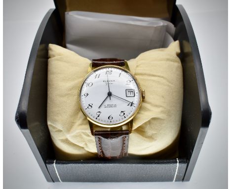 A mid century, circa 1960's  Delvina Geneve 17 Jewels Incabloc gentleman's wristwatch / watch.  Yellow metal case with hand w