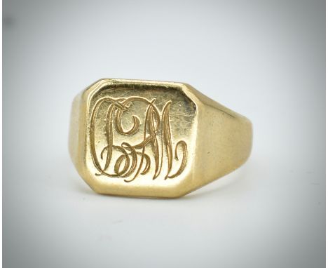 A 9ct gold Birmingham hallmarked signet ring with monogram cartouche. Hallmarked Birmingham, date letter P for 1989. Sponsors