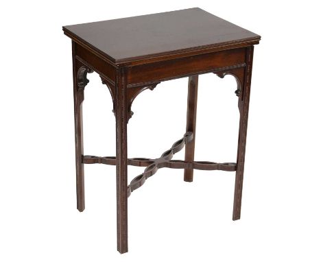 Edwardian mahogany card table, rectangular foldover top, the legs joined by carved rails, 56x40cm, height 73cm.Condition repo