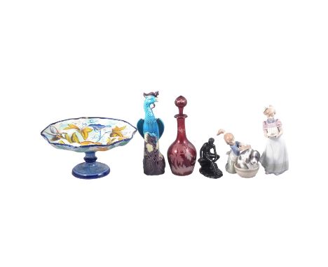 Cantagalli faience pottery fruit stand, 27cm diamter; Lladro and Nao figures, Ruby glass liqueur bottle, two cast metal figur