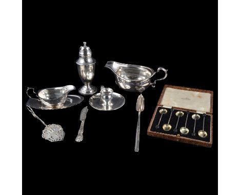 A Georgian silver marrow scoop, Thomas Northcote, London 1792; a three-piece silver condiments set, comprising mustard, salt 