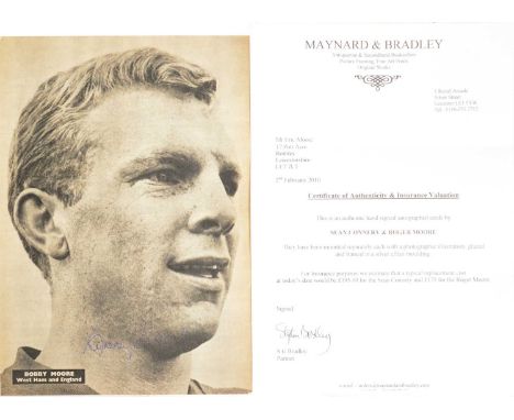 Football: Bobby Moore, West Ham/ England, signed magazine clipping in blue biro, sheet 28.5x20cm.