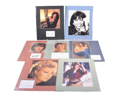 Music: a collection of assorted 1980s/90s female music stars includingKylie Minogue, signed single sheet, mounted with colour