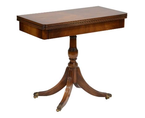 Reproduction mahogany foldover pedestal card table, the top with moulded egde, baize lined interior, turned column, four spla