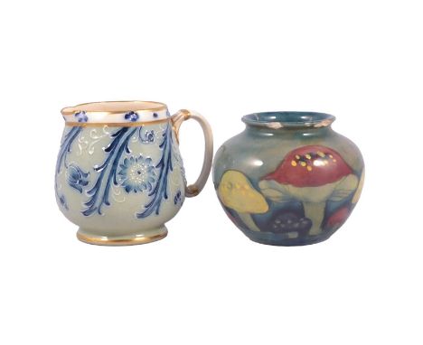 William Moorcroft, a Macintyre period 'Forian' cream jug, gilt oultines, 7.2cm; and a 'Claremont' vase, M66 shape, 1920s, 6.5