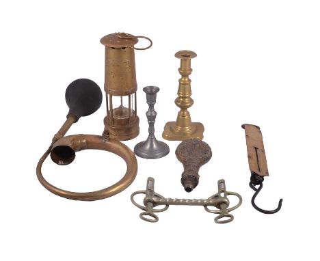 An F Thomas &amp; Williams Ltd brass miner’s lamp; pair of brass push-eject candlesticks, lobed rectangular base, 21cm; anoth