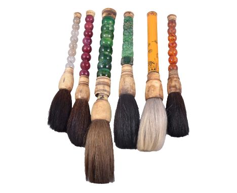 Six Chinese calligraphy brushes, hardstone and other handles.Qty: 6