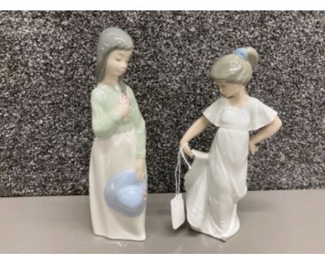 Two Nao by Lladro figures girl holding blue hat and another