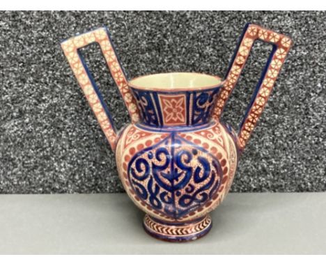 An Italian Faience two handled vase by Cantagalli 20.5cm high